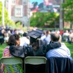 A 2021 Trinity College Graduate sitting with family